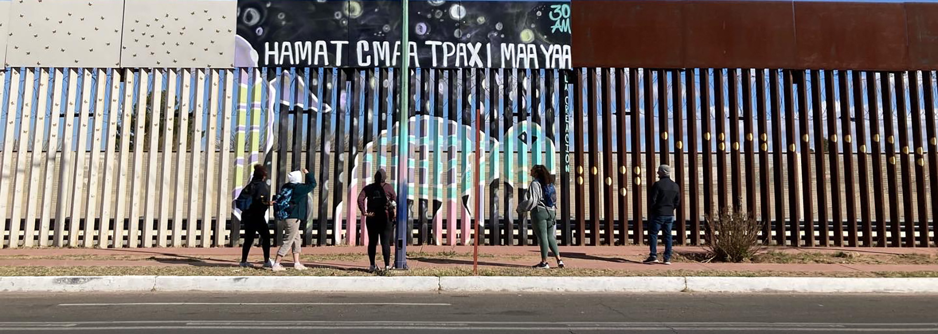 wide mural fence no sky